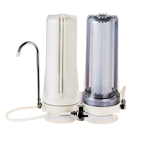 Sentry Water Filters dual counter top filter with one clear housing and one solid white housing